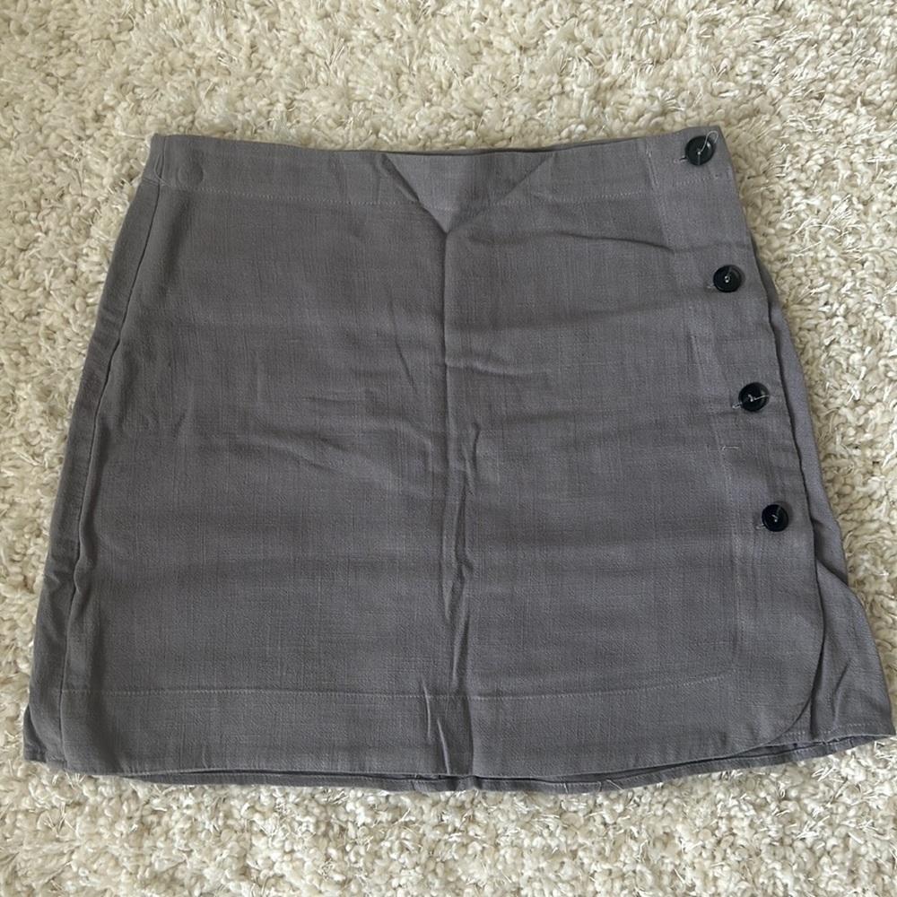 Medium grayish/blue mini skirt with button detailing